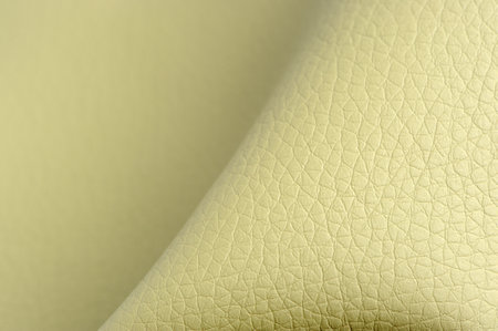 Macro shot of olive green patterned matt artificial leather textureの写真素材