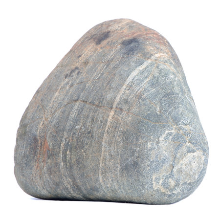 A layered stone isolated against a white background, emphasizing its distinct textures and natural patternsの写真素材