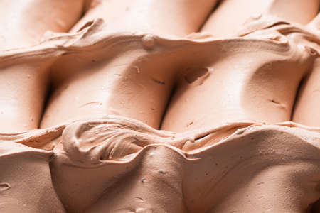 Coffee flavour gelato - full frame detail. Close up of a light brown surface texture of Coffee Ice...