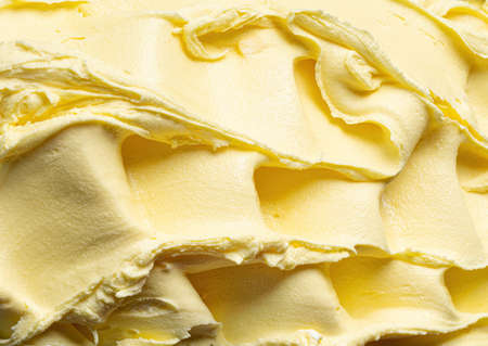 Frozen Pineapple flavour gelato - full frame detail. Close up of a yellow surface texture of Ice cream.の写真素材