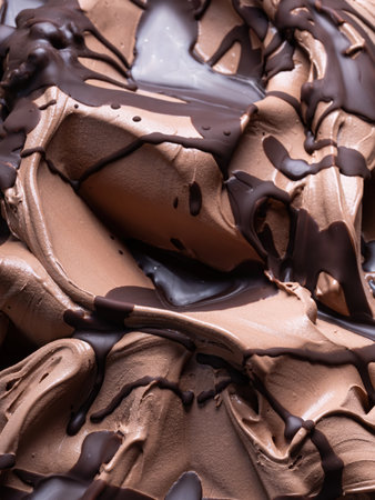 Chocolate flavour gelato - full frame detail. Close up of a brown surface texture of chocolate Ice cream covered with dark chocolate topping.の写真素材