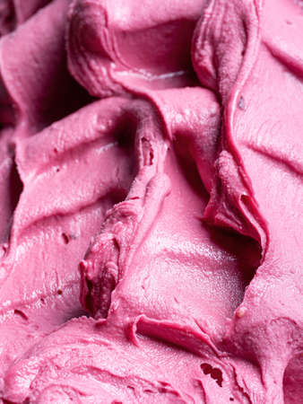 Frozen Pomegranate flavour gelato - full frame detail. Close up of a pink surface texture of Ice cream.の写真素材