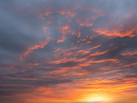 Dramatic dusk sky with clouds. Mysterious abstract heaven background pattern texture at sunset.の写真素材