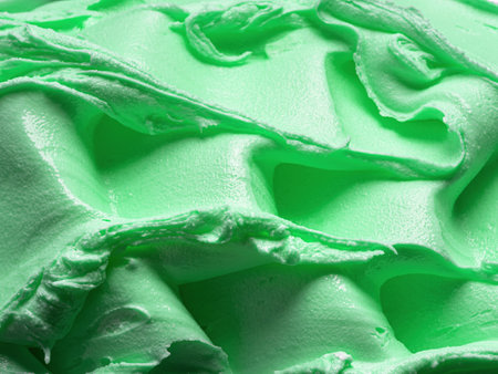 Frozen creamy Mint flavour gelato - full frame detail. Close up of a green surface texture of Ice cream.の写真素材
