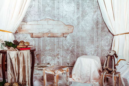 Christmas tree and the deer decoration over vintage backgroundの写真素材