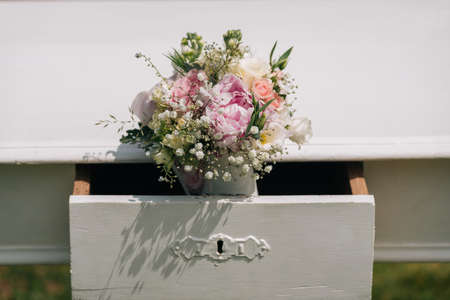 Vintage wedding table decorated with bouquetの写真素材