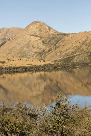 Hill side and lakeの写真素材