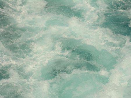Splashing caribbean blue water