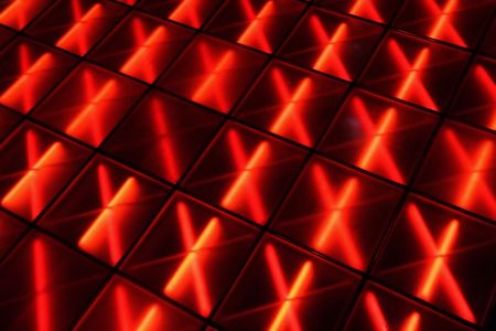 Red illuminated detail of a dance floor in a modern discoの写真素材