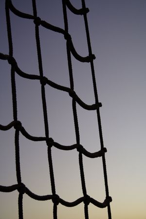 Rope ladder against violet sky in the sunsetの写真素材
