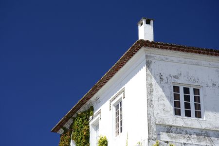 The facade of a historical european cottageの写真素材