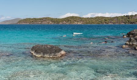 Coral reef with blue caribbean waterの写真素材