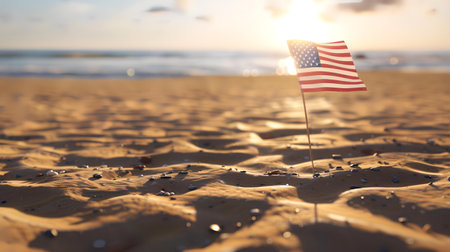 American flag on sand beach at sunset. United states of America travel concept.の素材