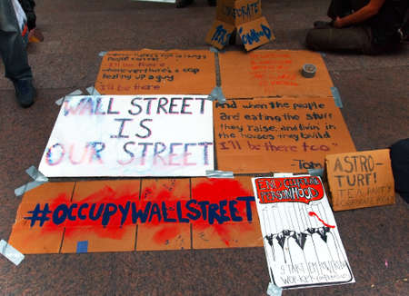 New York - September 21: Political messages are taped to the ground on the plaza at Zuccotti Park...