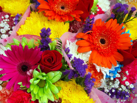 A vibrant, multi-colored collection of flower bouquets.の写真素材