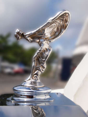 FENWICK ISLAND, DELAWARE - AUGUST 23, 2014: Closeup on the the \\\"Spirit of Ecstasy\\\" hood ornament, in profile, on a vintage Rolls Royce automobile on display at a car show.のeditorial素材