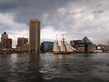 BALTIMORE, MD -  SEPTEMBER 11, 2014: Tall ship Lynx, from Portsmith, NH, takes an evening sail through Baltimore's Inner Harbor during the Star Spangled Spectacular which celebrates the 200th anniversary of America's National Anthem.のeditorial素材