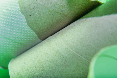 Close-up of empty toilet paper tubes in soft focus. Background on the theme of ecology and recycling of materials.の写真素材