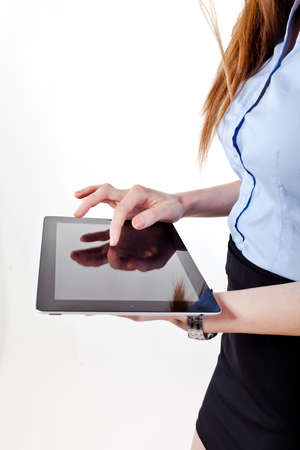 young attractive business woman holding a tablet pcの写真素材