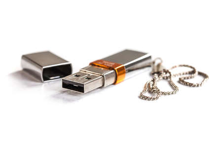 silver usb stick on white backgroundの写真素材