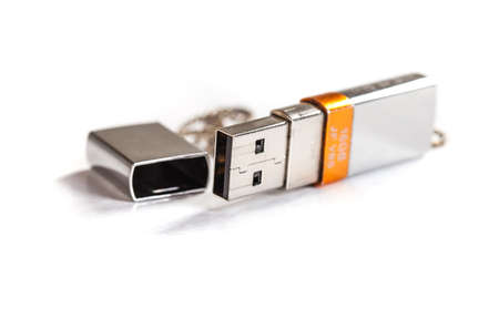 silver usb stick on white backgroundの写真素材