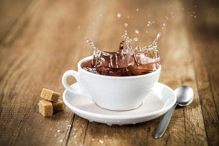 fresh healthy tea splash in a tea-cup