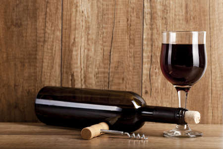 red wine on wooden background still life imageの写真素材