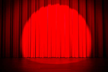 3d red curtain lit by spot light の写真素材
