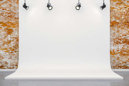 3d studio setup with white canvas background and ceiling lightsの写真素材