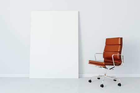 3d armchair and blank white frame canvas