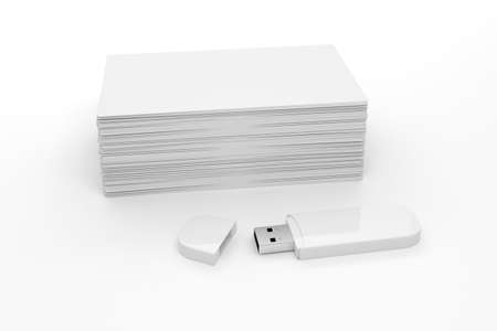 3d blank white business cards and usb memory stick  isolated on a white backgroundの写真素材
