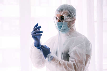 Man doctor or scientist waring protective suit, and face mask の写真素材