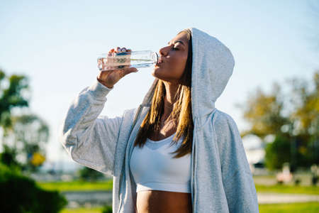 beautiful strong and fit woman working out outside