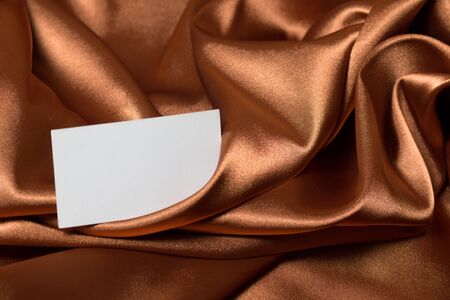 Greeting card with space for text on a luxury satin fabricの写真素材
