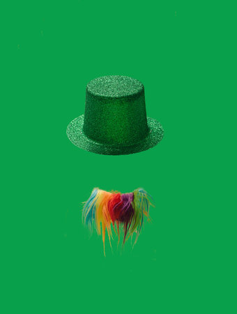 St. Patrick's Day  celebration concept. Irish glitter hat and  rainbow beard on green background.の写真素材