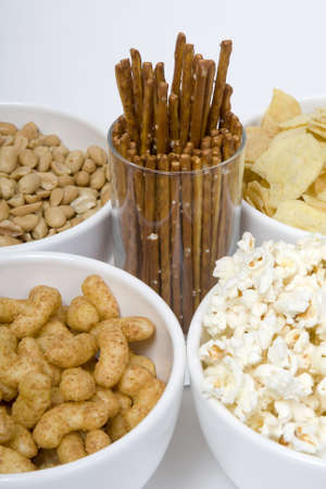 chips peanuts popcorn salted sticks snacksの写真素材