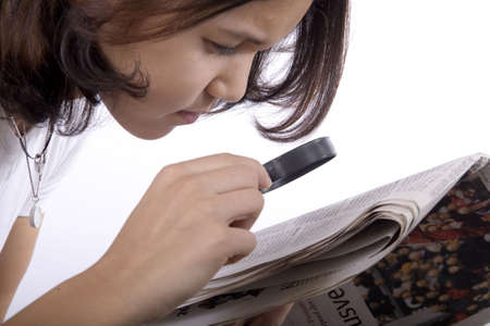 Read with a magnifying glassの写真素材