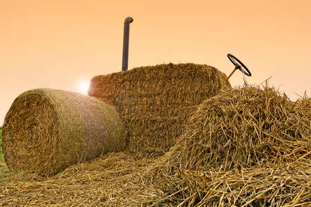 Tractor from bales of strawの写真素材