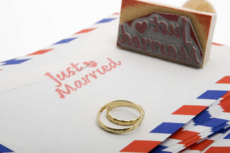 just married, announcement with a stamp on envelope