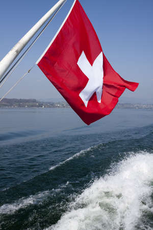 Swiss flag, Zurich seaの写真素材