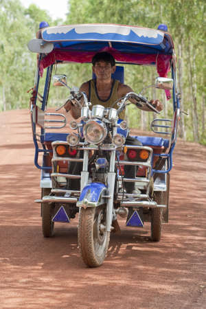 Tuk Tuk in Thailand with driver, popular transportation in Asiaの写真素材