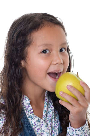 Girl eats appleの写真素材