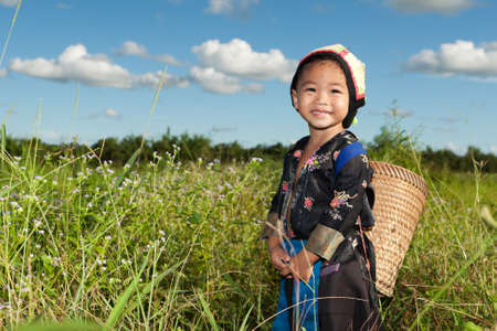 asian hmong girl on rice paddyの写真素材