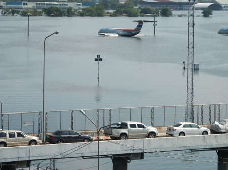 Bangkok, Thailand - November 8, 2011: Heavy flooding in Thailand since July is slowly encroaching on the capital, Bangkok on the 8 of November 2011 at Don Muang area in Bangkok.のeditorial素材