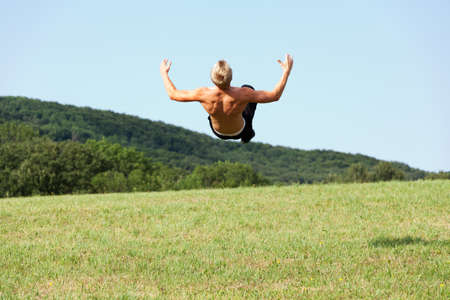 Somersault in the natureの写真素材