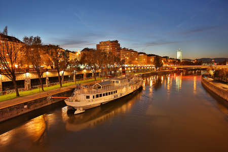 Vienna at night, danube canal, pier near Schwedenplatz in central Viennaの写真素材