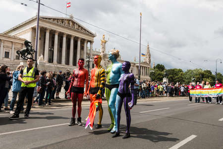 Vienna, Austria - Juni 20, 2015: Lesbian, gay and transgender people celebrate their importent event on the Ringstrasse of Vienna for solidarity, acceptance and equality. The Rainbow Parade is part of Vienna Pride.のeditorial素材