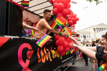 Vienna, Austria - June 16, 2018: Participants walk on the vienna Ring Strasse for Love Respect and Solidarity. Visitors watch the hustle and bustleのeditorial素材