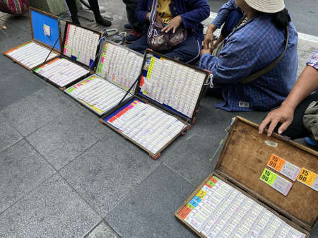 Bangkok, Thailand - December 11, 2019:  Lottery is very popular in Thailand and the relationship is...