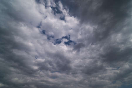 dramatic sky with cumulus clouds for use as background